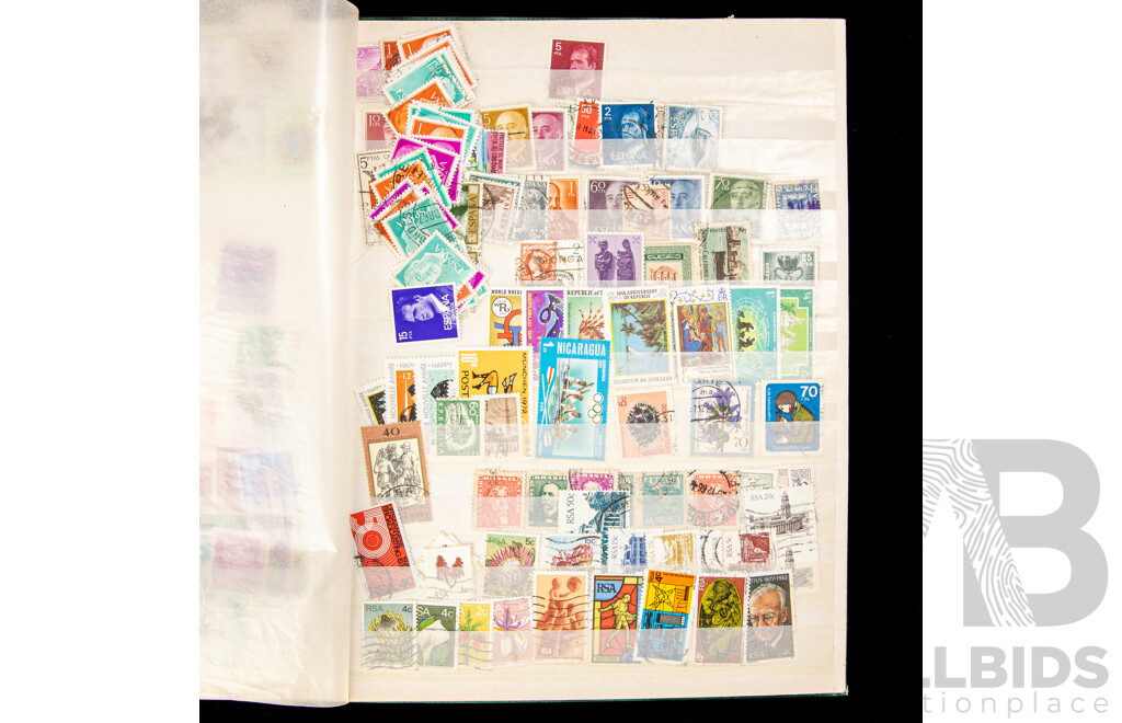 Album of Cancelled International Stamps Including Malaya, Canada, Zimbabwe, Germany, Philippines, Fiji, Italy, Poland, South Africa and More