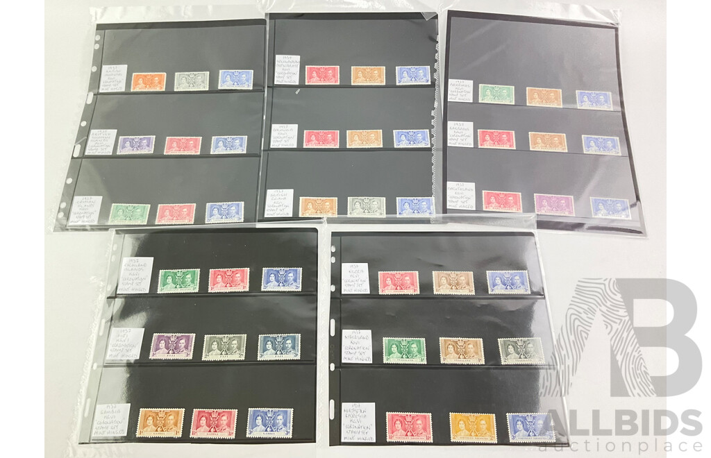 Collection of 1937 Coronation Stamp Sets Mint/Hinged From British Honduras, British Solomon Islands, Cayman Islands, Bechuanaland Protectorate, Bermuda, British Guiana, Bahamas, Barbados, Basutoland and More