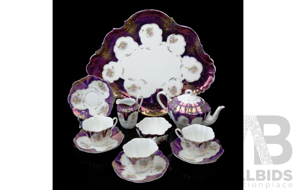 Antique Continental Eleven Piece Porcelain Teas Service with Hand Painted Floral Detail