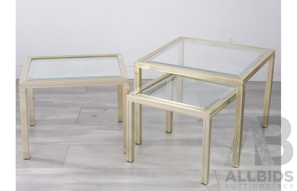 Nest of Three Pierre Vandel Glass and Gold Occasional Tables