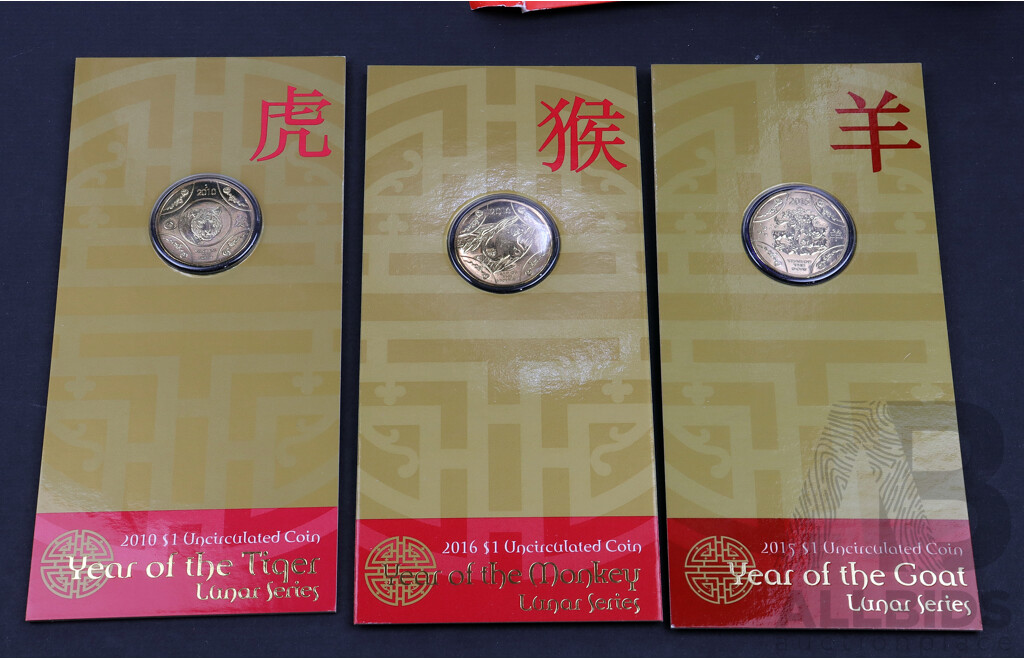 2012 Year of the Tiger $1 coins, Goat and Monkey.