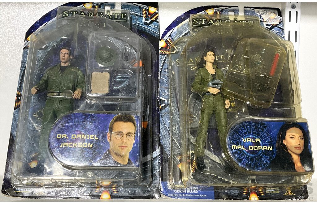 Two Star Gate Boxed Figurines of Vala Mal Doran and Dr. Daniel Jackson