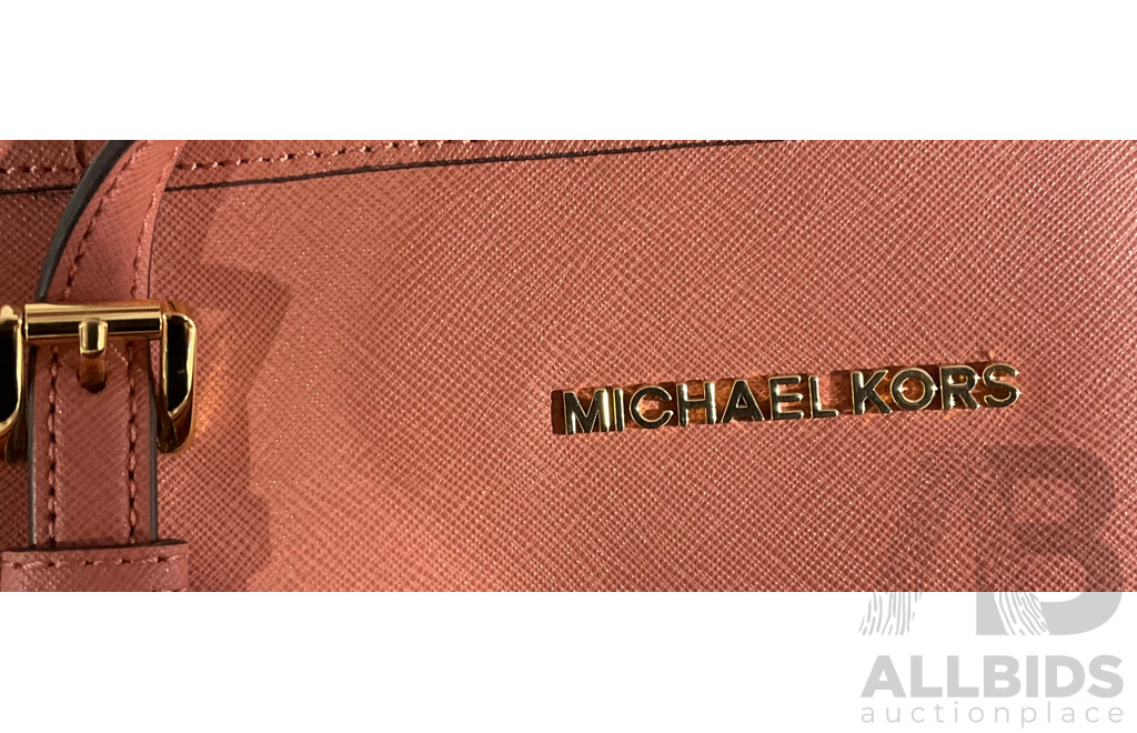 Two Michael Kors Hand Bags - One in Plum, One in Peach with One Generic Dust Bag