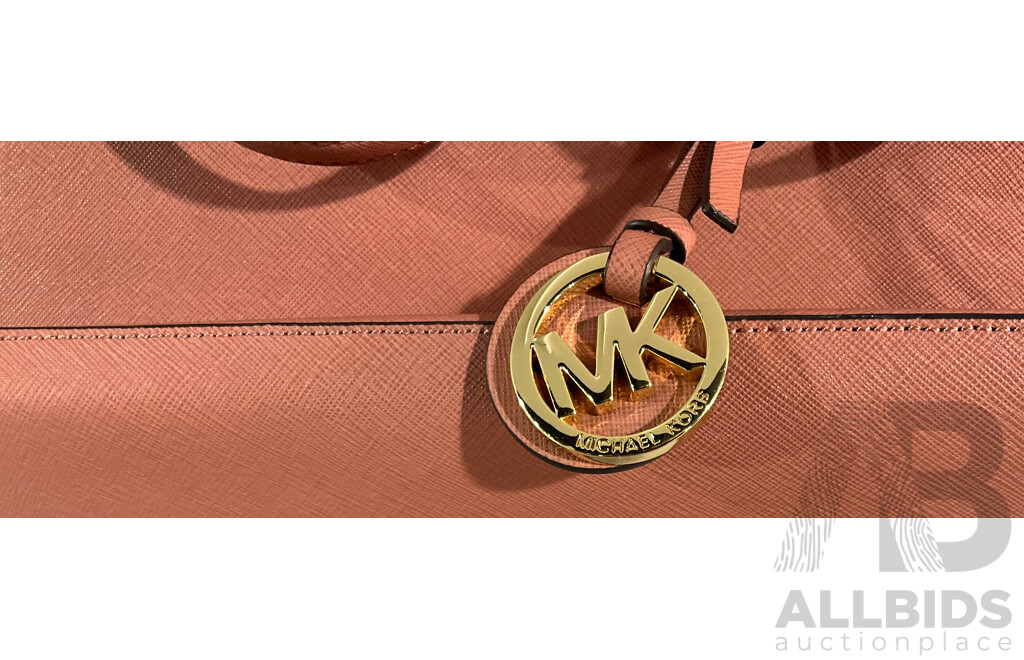 Two Michael Kors Hand Bags - One in Plum, One in Peach with One Generic Dust Bag