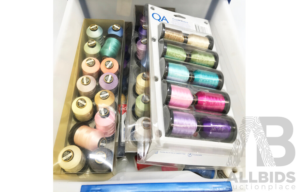 Knitting and Sewing Supplies in Storage Stack