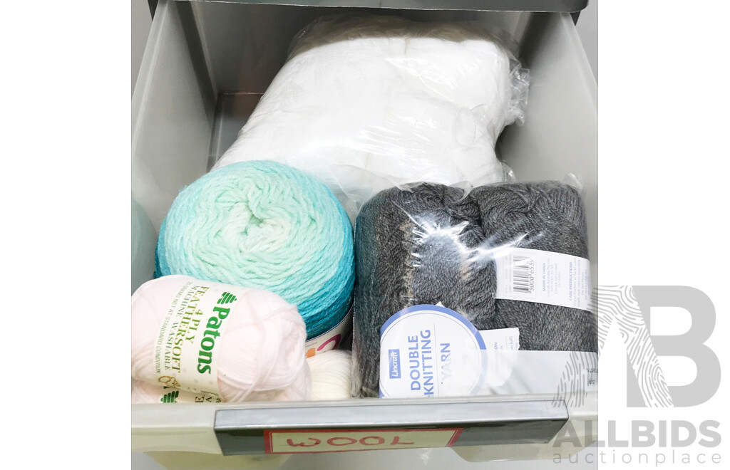Knitting and Sewing Items in Storage Stack
