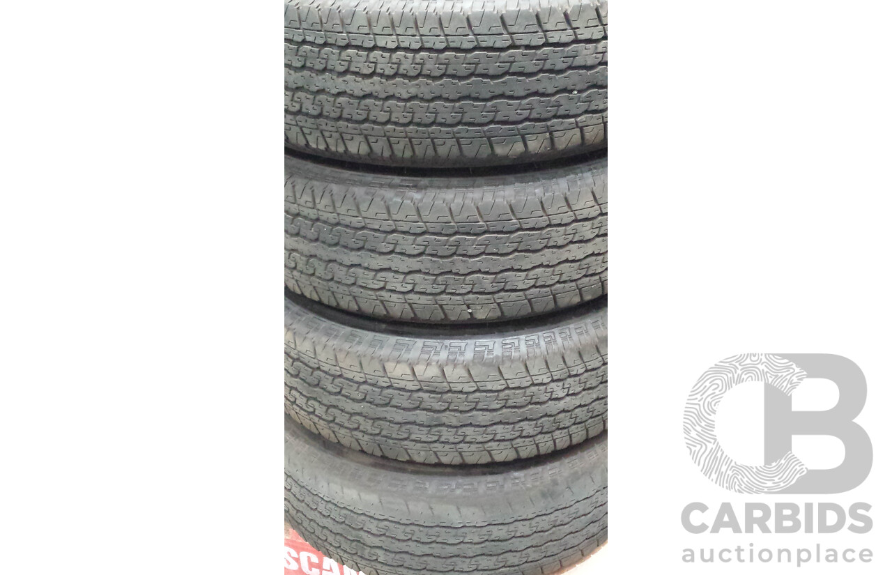 Toyota Hilux 16 Inch Six Stud Alloy Wheels with Bridgestone Dueler H/T  Tyres - Set of Four