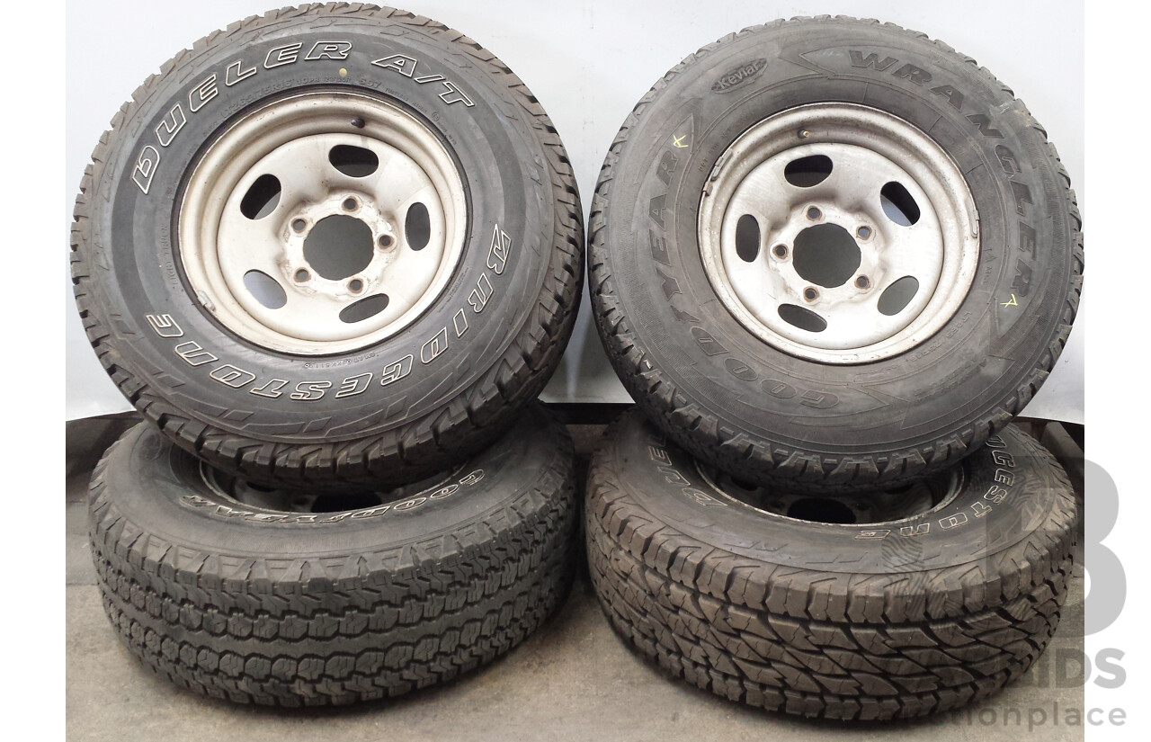 Toyota Land Cruiser 100/105 Series 16 Inch Five Stud Steel Wheels with Goodyear Wrangler and Bridgestone Dueler Tyres - Set of Four