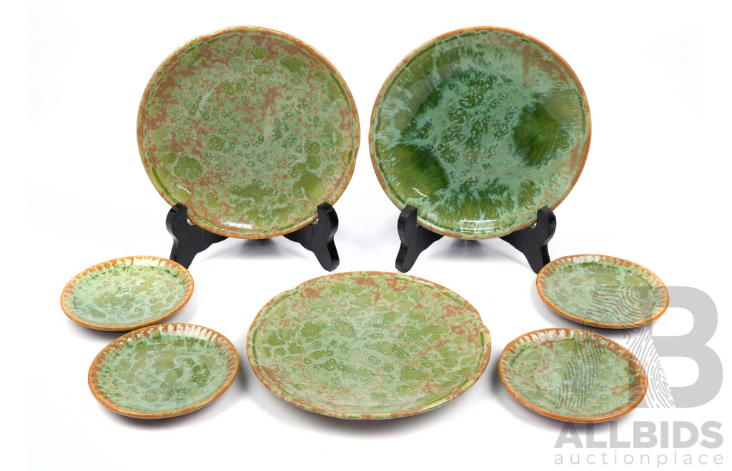 Set Seven Matching Small Pottery Plates with Crystaline Glaze