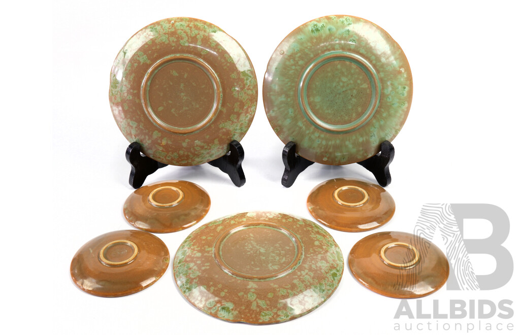 Set Seven Matching Small Pottery Plates with Crystaline Glaze