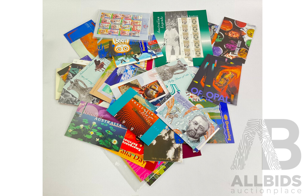 Collection of Australian 1990's Stamp Packs Including German/China Joint Issue, Donald Bradman, Centenary of the AFL and More