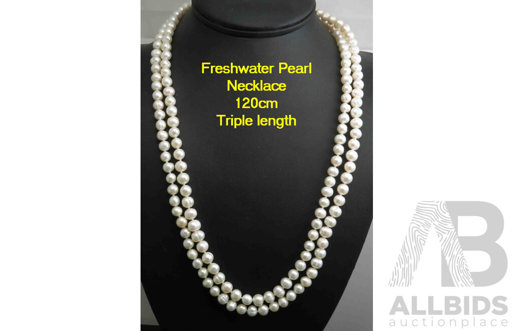 Extra Long Necklace of white Freshwater Cultured Pearls