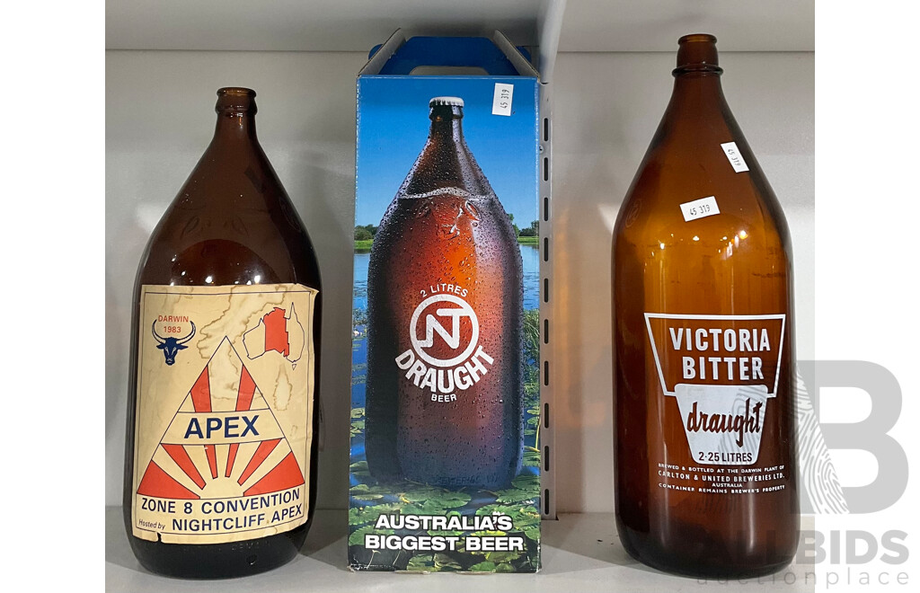 Two Bottles of NT Draught (One Empty) and Avictoria Bitter Draught