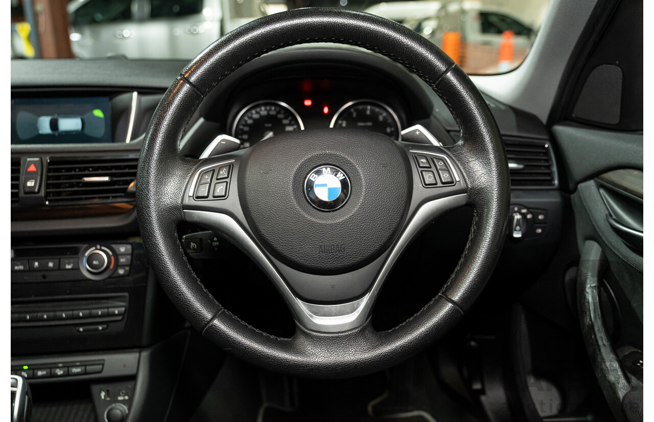 09/2013 BMW X1 Xdrive 28i (AWD) E84 MY13 4d Wagon Black Turbo 2.0L
