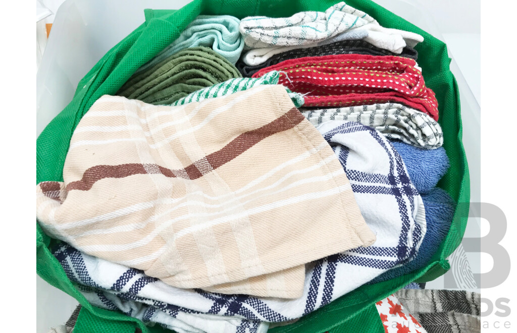 Assorted Kitchen Aprons, Towels, and Clothes