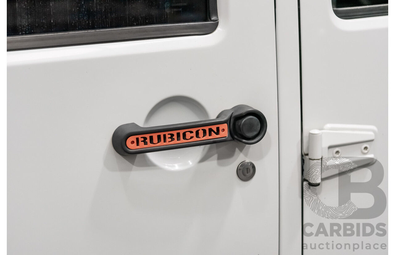3/2011 Jeep Wrangler Unlimited Rubicon (4x4) JK MY11 4d Softtop White 3.8L - Modified