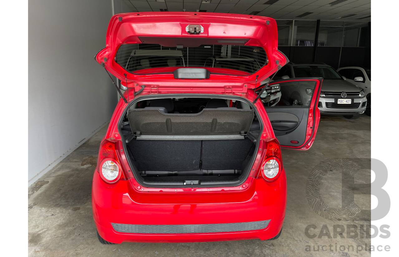 06/09 Holden Barina  FWD TK MY09 3D Hatchback Red 1.6L