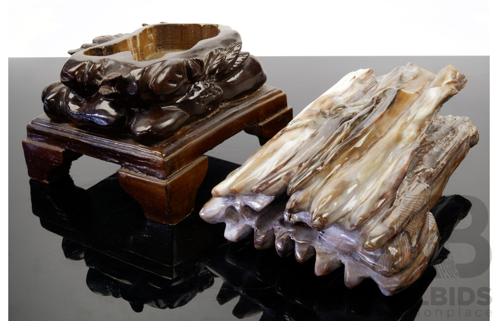 Polished Chinese Petrified Fossilized Wood with Termite Holes on Hand Carved Wooden Stand