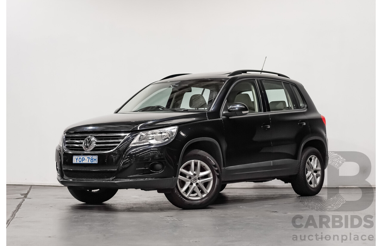 12/2009 Volkswagen Tiguan 125TSI (4x4) 5NC MY10 4D Wagon Black Turbo 2.0L