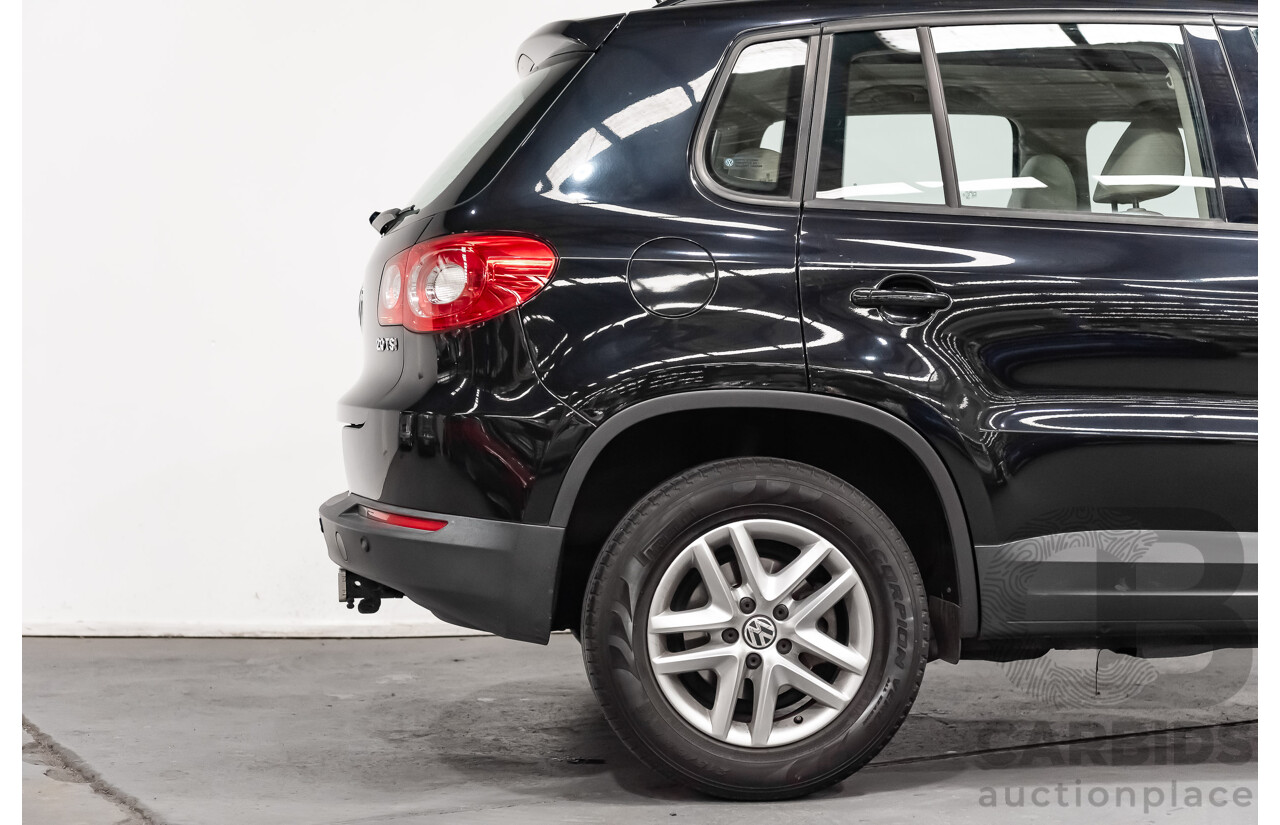 12/2009 Volkswagen Tiguan 125TSI (4x4) 5NC MY10 4D Wagon Black Turbo 2.0L