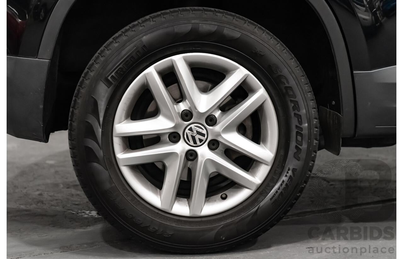 12/2009 Volkswagen Tiguan 125TSI (4x4) 5NC MY10 4D Wagon Black Turbo 2.0L