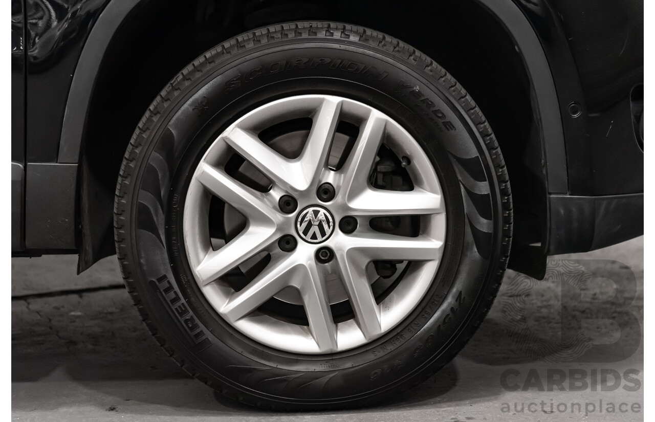 12/2009 Volkswagen Tiguan 125TSI (4x4) 5NC MY10 4D Wagon Black Turbo 2.0L