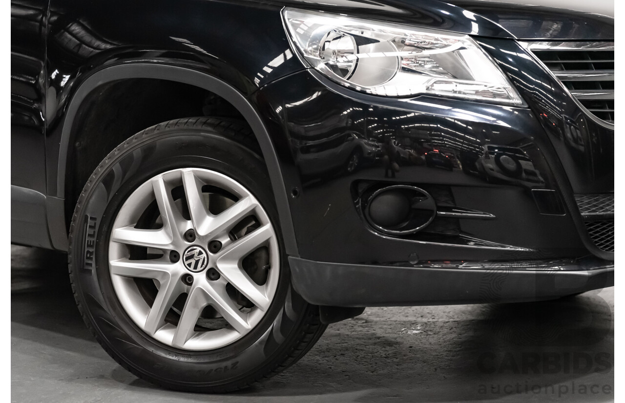 12/2009 Volkswagen Tiguan 125TSI (4x4) 5NC MY10 4D Wagon Black Turbo 2.0L