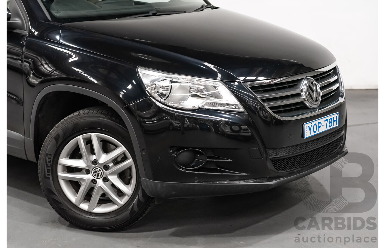 12/2009 Volkswagen Tiguan 125TSI (4x4) 5NC MY10 4D Wagon Black Turbo 2.0L