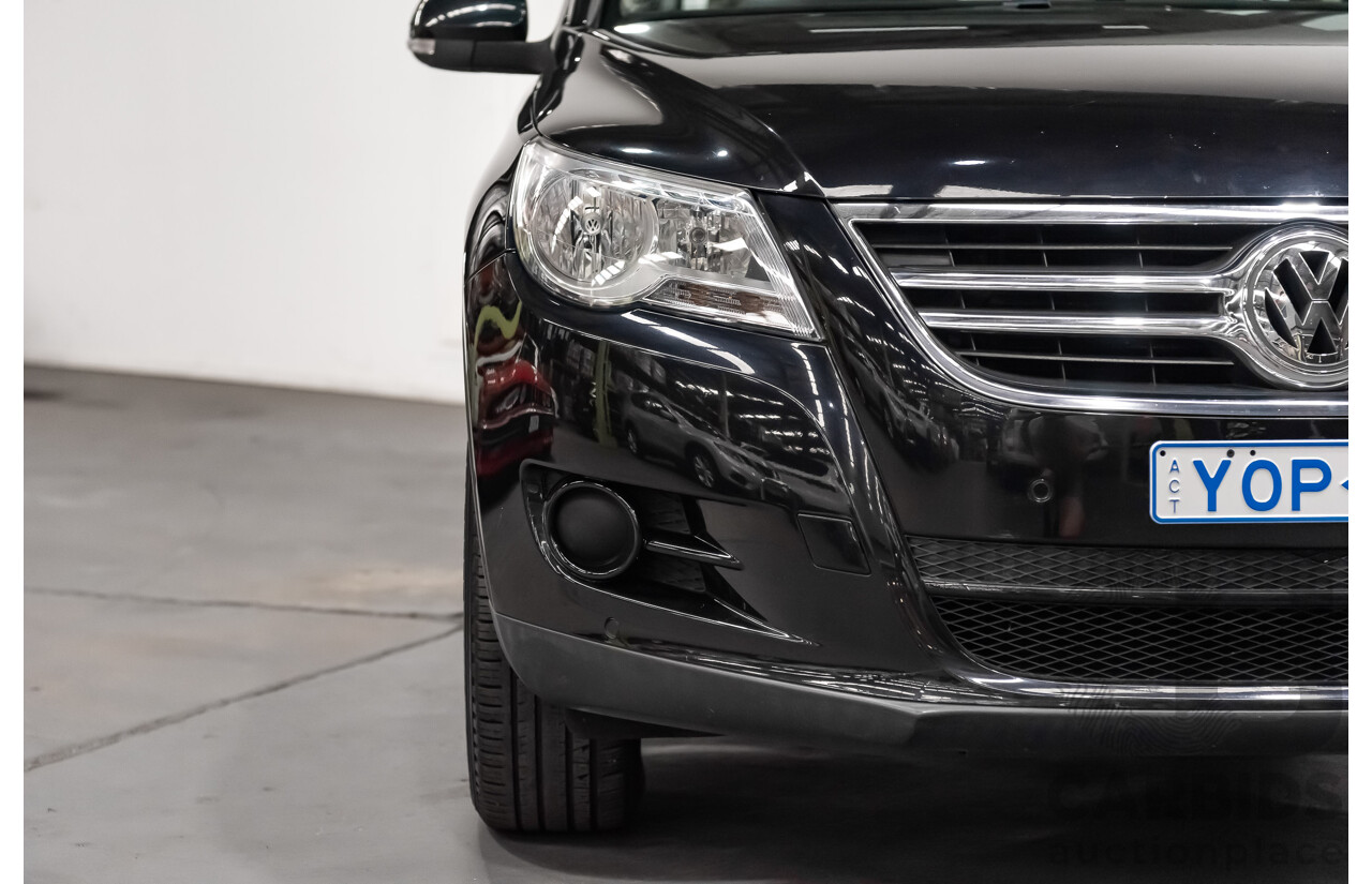 12/2009 Volkswagen Tiguan 125TSI (4x4) 5NC MY10 4D Wagon Black Turbo 2.0L