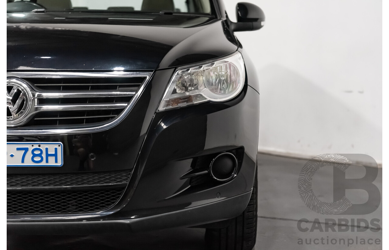 12/2009 Volkswagen Tiguan 125TSI (4x4) 5NC MY10 4D Wagon Black Turbo 2.0L