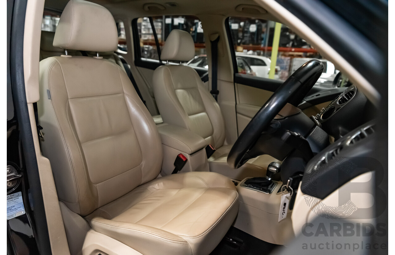 12/2009 Volkswagen Tiguan 125TSI (4x4) 5NC MY10 4D Wagon Black Turbo 2.0L