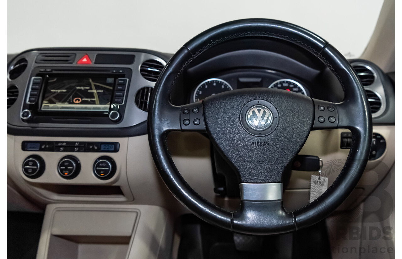 12/2009 Volkswagen Tiguan 125TSI (4x4) 5NC MY10 4D Wagon Black Turbo 2.0L