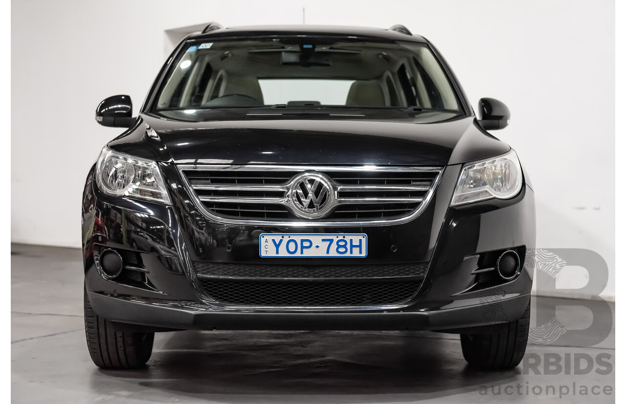 12/2009 Volkswagen Tiguan 125TSI (4x4) 5NC MY10 4D Wagon Black Turbo 2.0L