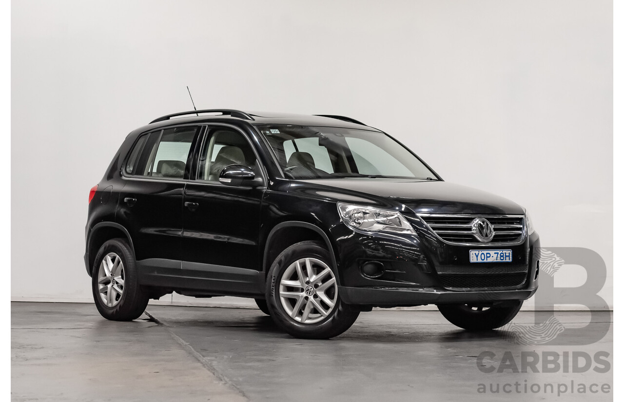 12/2009 Volkswagen Tiguan 125TSI (4x4) 5NC MY10 4D Wagon Black Turbo 2.0L