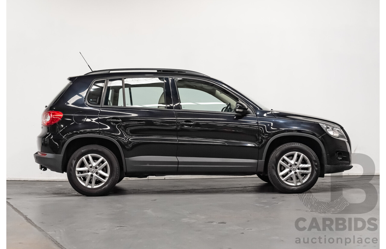 12/2009 Volkswagen Tiguan 125TSI (4x4) 5NC MY10 4D Wagon Black Turbo 2.0L