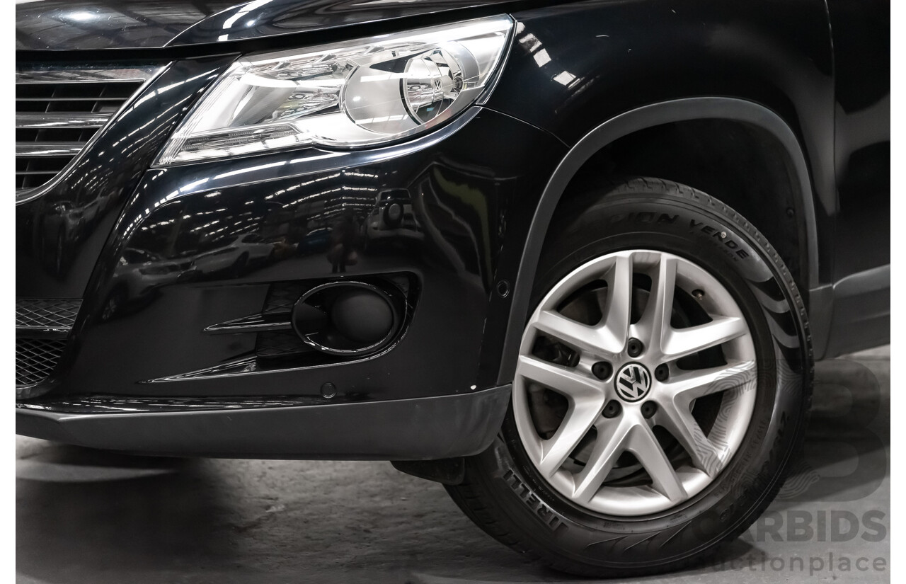 12/2009 Volkswagen Tiguan 125TSI (4x4) 5NC MY10 4D Wagon Black Turbo 2.0L