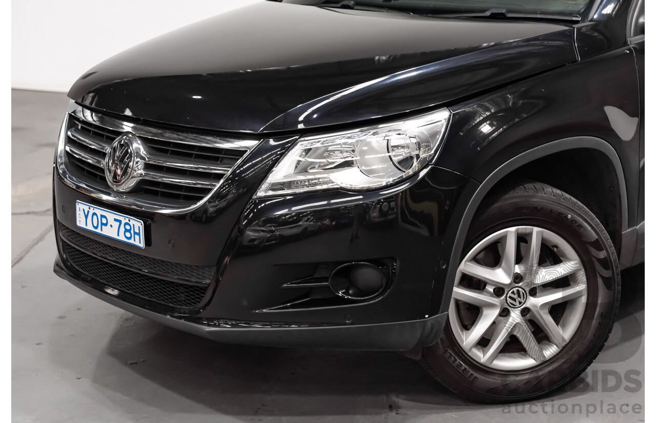 12/2009 Volkswagen Tiguan 125TSI (4x4) 5NC MY10 4D Wagon Black Turbo 2.0L