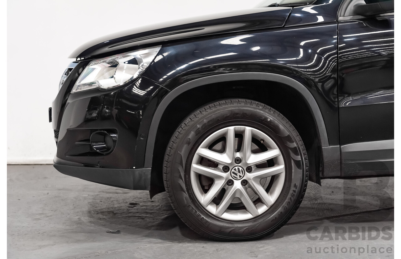 12/2009 Volkswagen Tiguan 125TSI (4x4) 5NC MY10 4D Wagon Black Turbo 2.0L