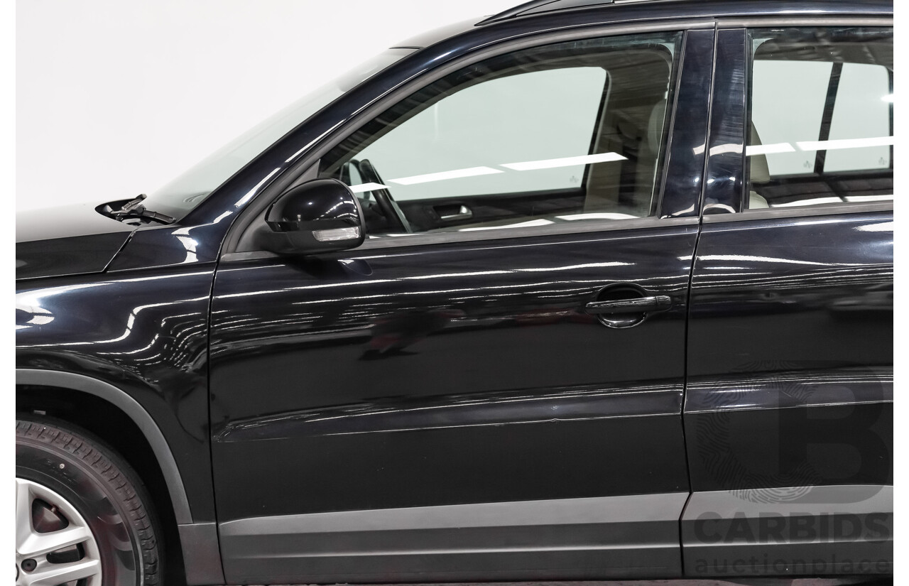 12/2009 Volkswagen Tiguan 125TSI (4x4) 5NC MY10 4D Wagon Black Turbo 2.0L