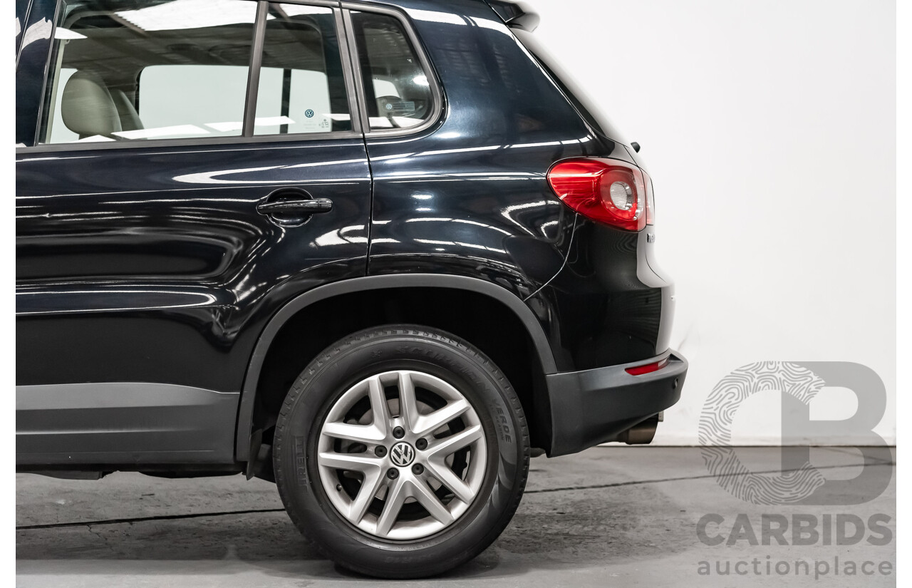 12/2009 Volkswagen Tiguan 125TSI (4x4) 5NC MY10 4D Wagon Black Turbo 2.0L