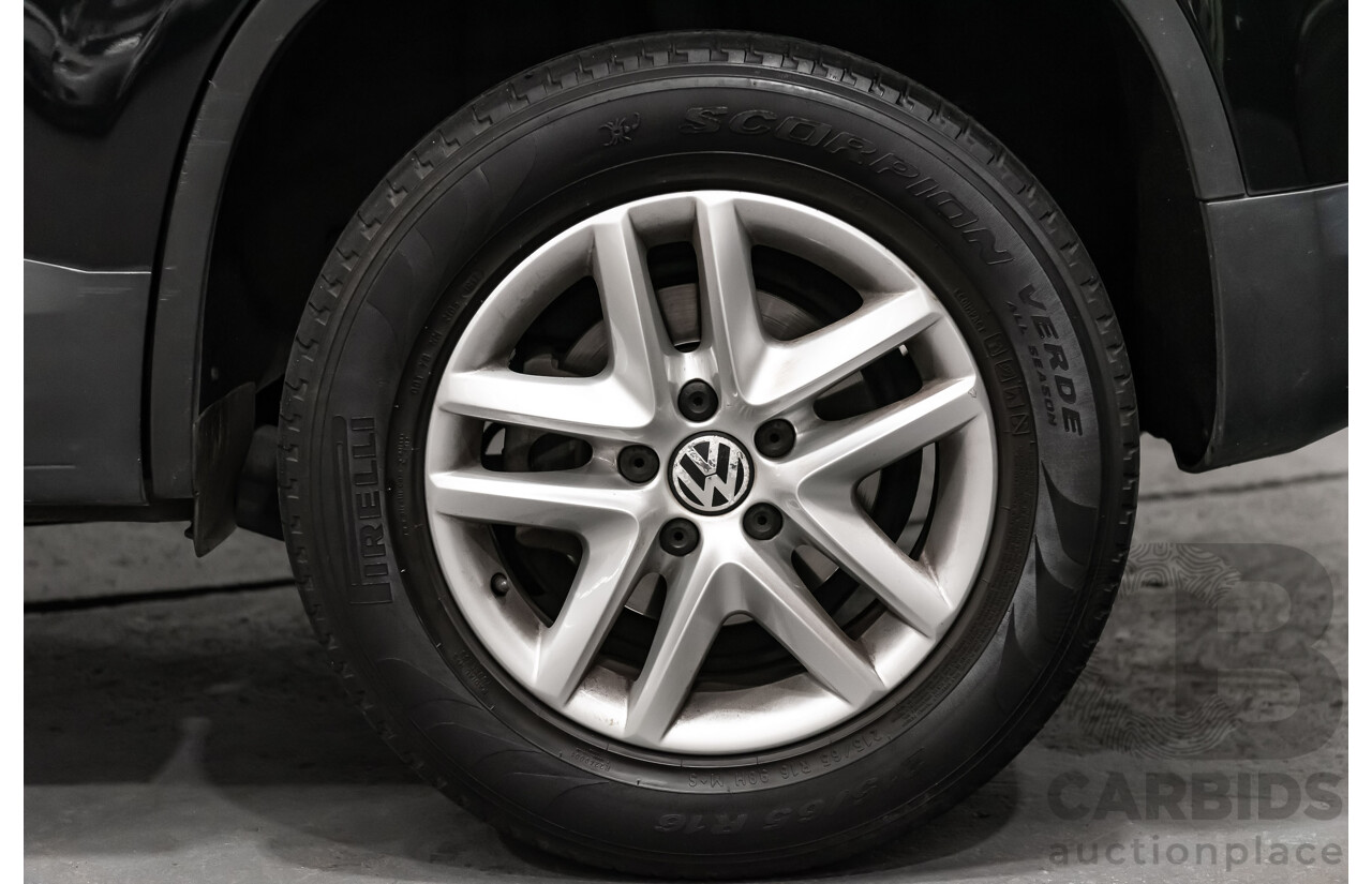 12/2009 Volkswagen Tiguan 125TSI (4x4) 5NC MY10 4D Wagon Black Turbo 2.0L