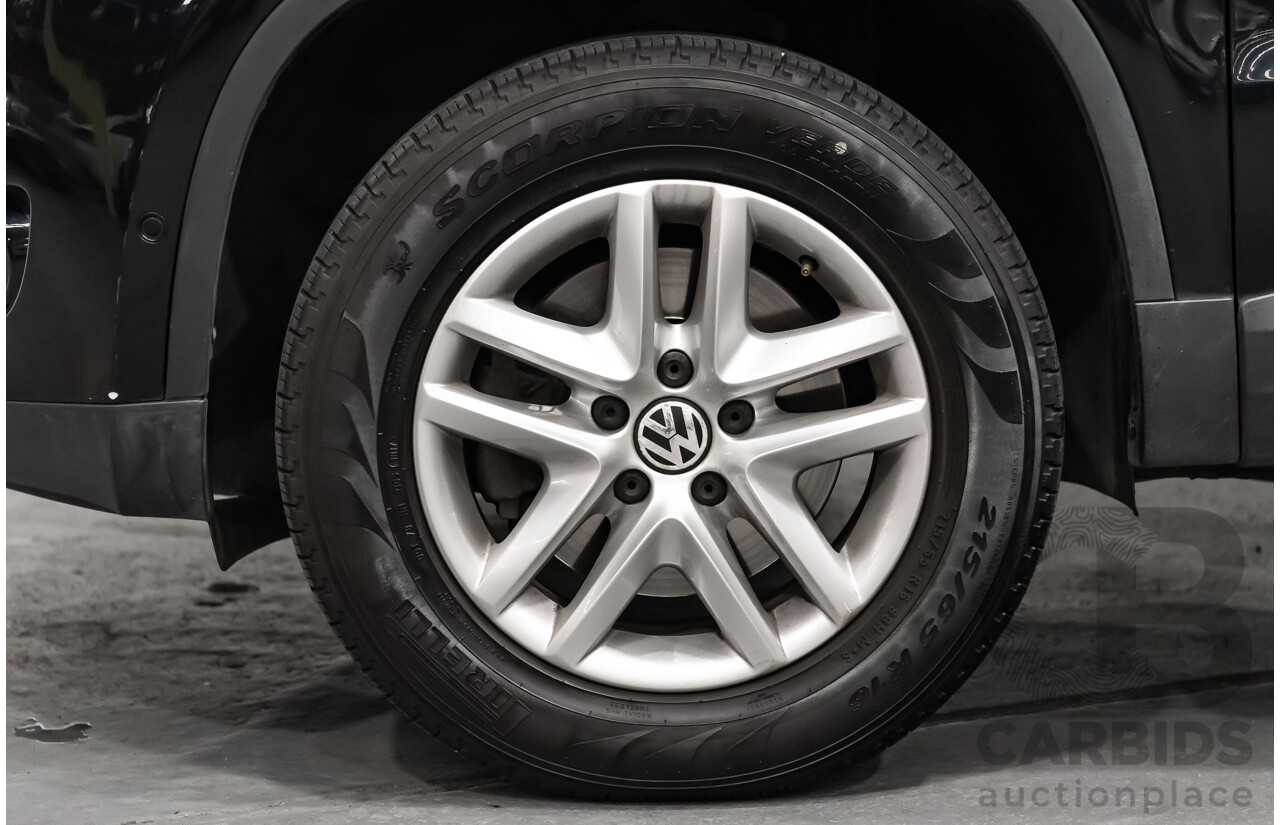 12/2009 Volkswagen Tiguan 125TSI (4x4) 5NC MY10 4D Wagon Black Turbo 2.0L