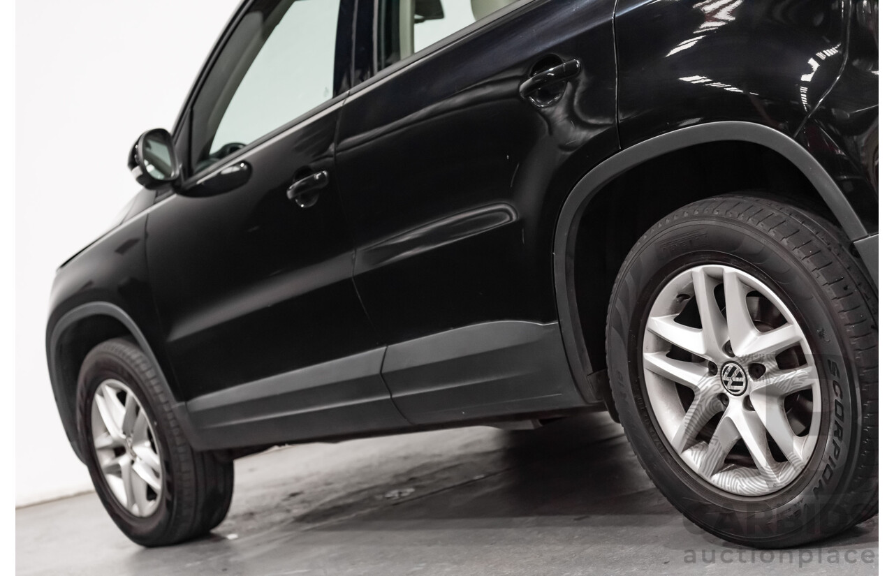 12/2009 Volkswagen Tiguan 125TSI (4x4) 5NC MY10 4D Wagon Black Turbo 2.0L