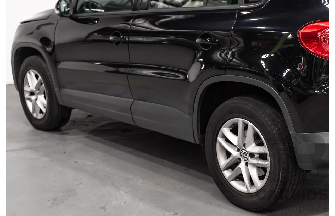 12/2009 Volkswagen Tiguan 125TSI (4x4) 5NC MY10 4D Wagon Black Turbo 2.0L