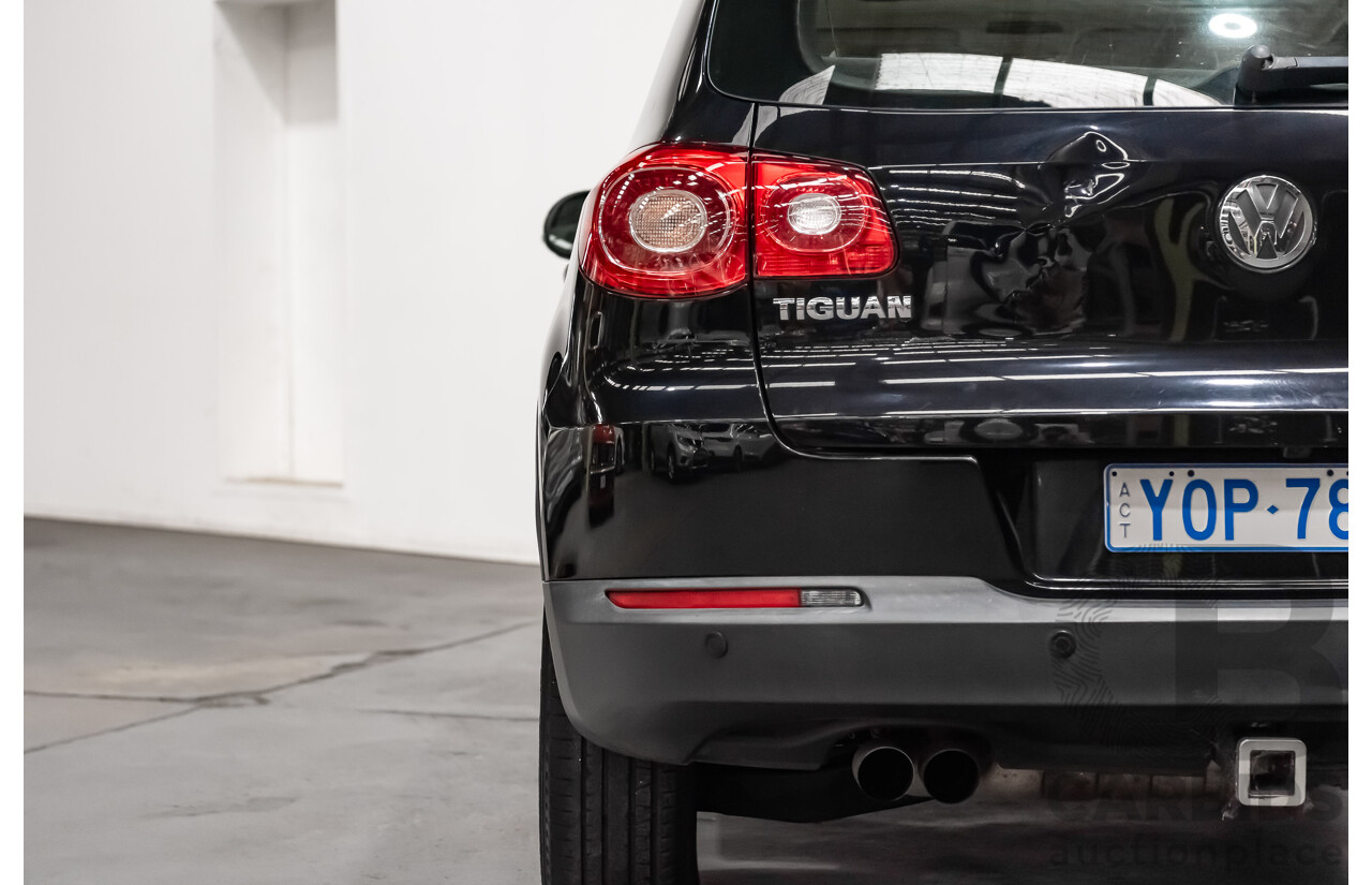 12/2009 Volkswagen Tiguan 125TSI (4x4) 5NC MY10 4D Wagon Black Turbo 2.0L