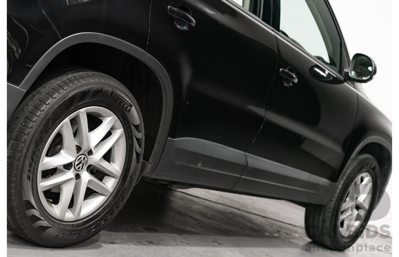 12/2009 Volkswagen Tiguan 125TSI (4x4) 5NC MY10 4D Wagon Black Turbo 2.0L