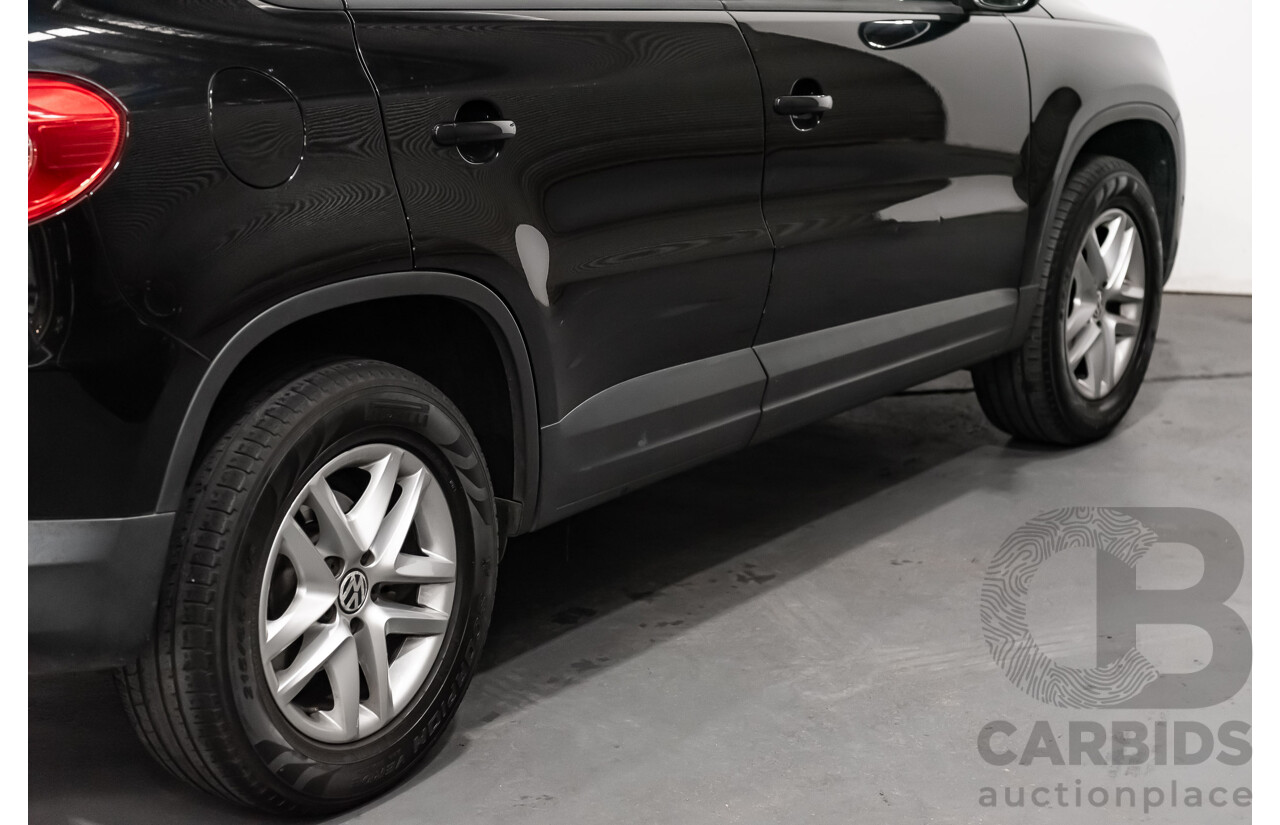 12/2009 Volkswagen Tiguan 125TSI (4x4) 5NC MY10 4D Wagon Black Turbo 2.0L