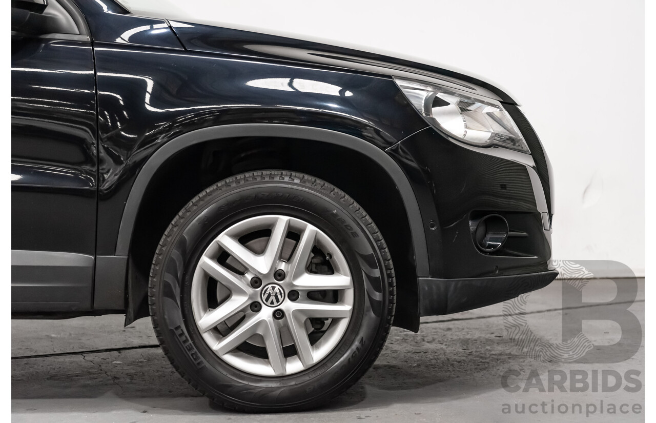 12/2009 Volkswagen Tiguan 125TSI (4x4) 5NC MY10 4D Wagon Black Turbo 2.0L