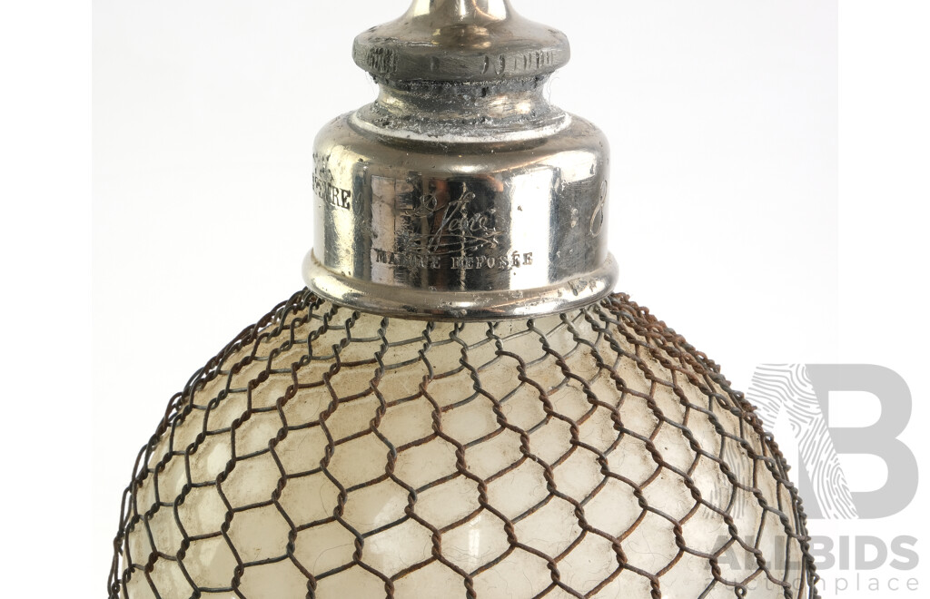 French Double-Ball Soda Syphon with Metal Wire Mesh Circa 1910. Imprinted 'Veritable Seltzogene D Fevre - Marque Deposee'