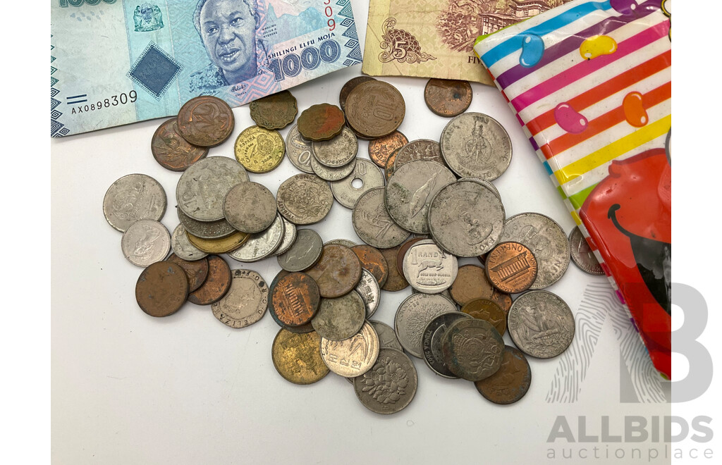 Collection of International Currency Including Tanzanian/Bhutan Bank Notes and Coins From USA, Tonga, Canada, Euro and More